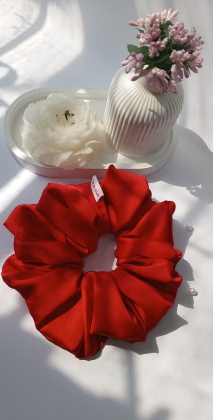 Scranchlab Cherry Red Silk Scrunchie - angled lifestyle shot