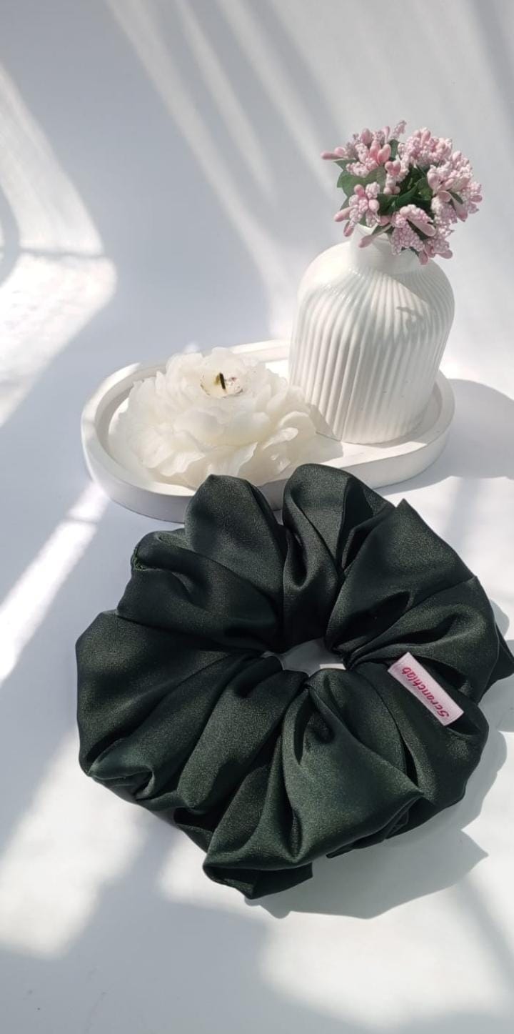 Scranchlab Midnight Green Silk Scrunchie with white flower and vase - top view
